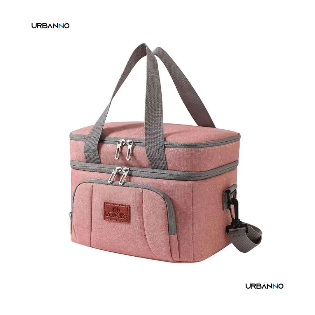 Bolsa térmica rosa com alças cinzas e dois compartimentos, fundo branco. Urbanno.