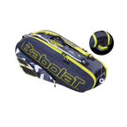 Raqueteira Babolat RH6 Pure Aero preta e amarela, vista lateral. Destaque para o compartimento ventilado e independente para sapatos na ponta da raqueteira.