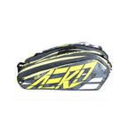 Raqueteira Babolat RH6 Pure Aero lateral. Destaque para o grafismo agressivo preto, cinza e amarelo neon, com o nome "AERO" e "PURE" visíveis.