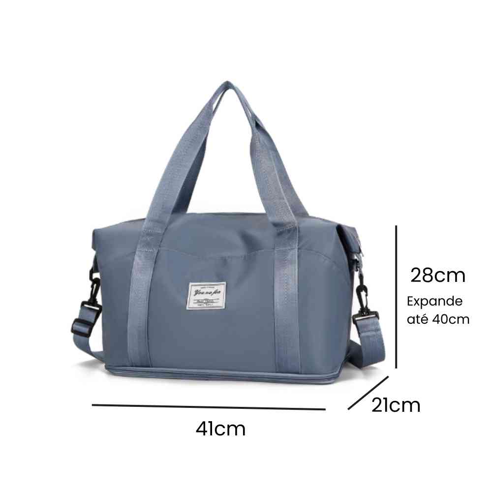 Bolsa de Academia e Viagem Feminina Leve Expansível Azul Petróleo Urbanno, com linhas indicando suas dimensões de 41cm de comprimento, 21cm de largura e 28cm de altura (expansível até 40cm).