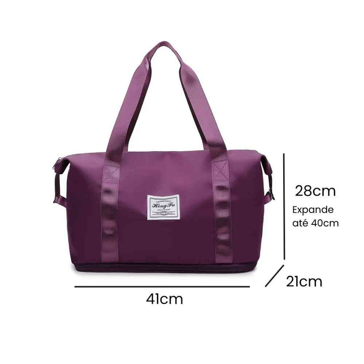 Bolsa de Academia e Viagem Feminina Leve Expansível Vinho Urbanno, com linhas indicando suas dimensões de 41cm de comprimento, 21cm de largura e 28cm de altura (expansível até 40cm).
