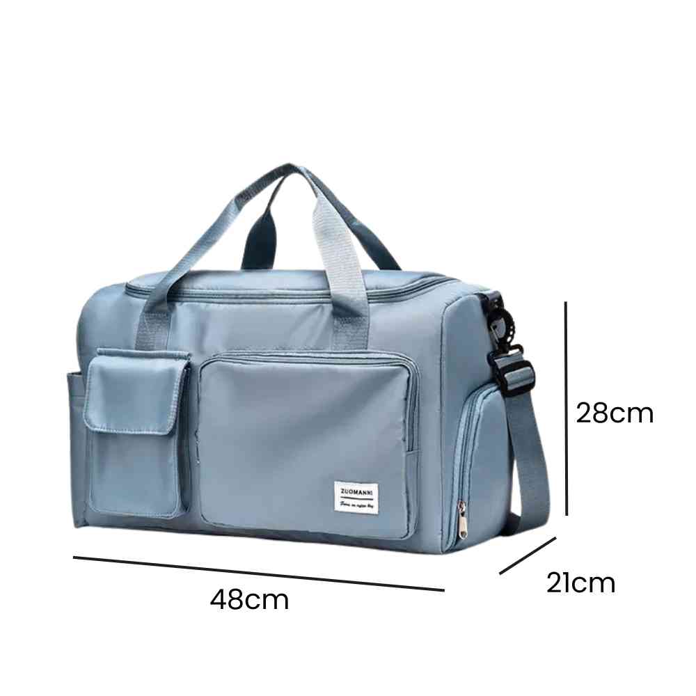 Bolsa de Academia e Viagem Feminina Multifuncional Azul Bebê Urbanno, com linhas indicando suas dimensões de 48cm de comprimento, 28cm de altura e 21cm de profundidade.