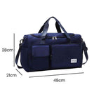 Bolsa de Academia e Viagem Feminina Multifuncional Azul Escuro Urbanno, com linhas indicando suas dimensões de 48cm de comprimento, 28cm de altura e 21cm de profundidade.
