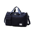 Bolsa de Academia e Viagem Feminina Multifuncional Azul Escuro Urbanno, vista frontal, com múltiplos bolsos e alças azuis, destacando sua funcionalidade e design elegante.