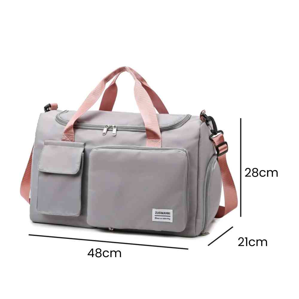 Bolsa de Academia e Viagem Feminina Multifuncional Cinza com Alça Rosa Urbanno, com linhas indicando suas dimensões de 48cm de comprimento, 28cm de altura e 21cm de profundidade.