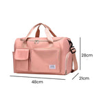 Bolsa de Academia e Viagem Feminina Multifuncional Rosa Pêssego Urbanno, com linhas indicando suas dimensões de 48cm de comprimento, 28cm de altura e 21cm de profundidade.