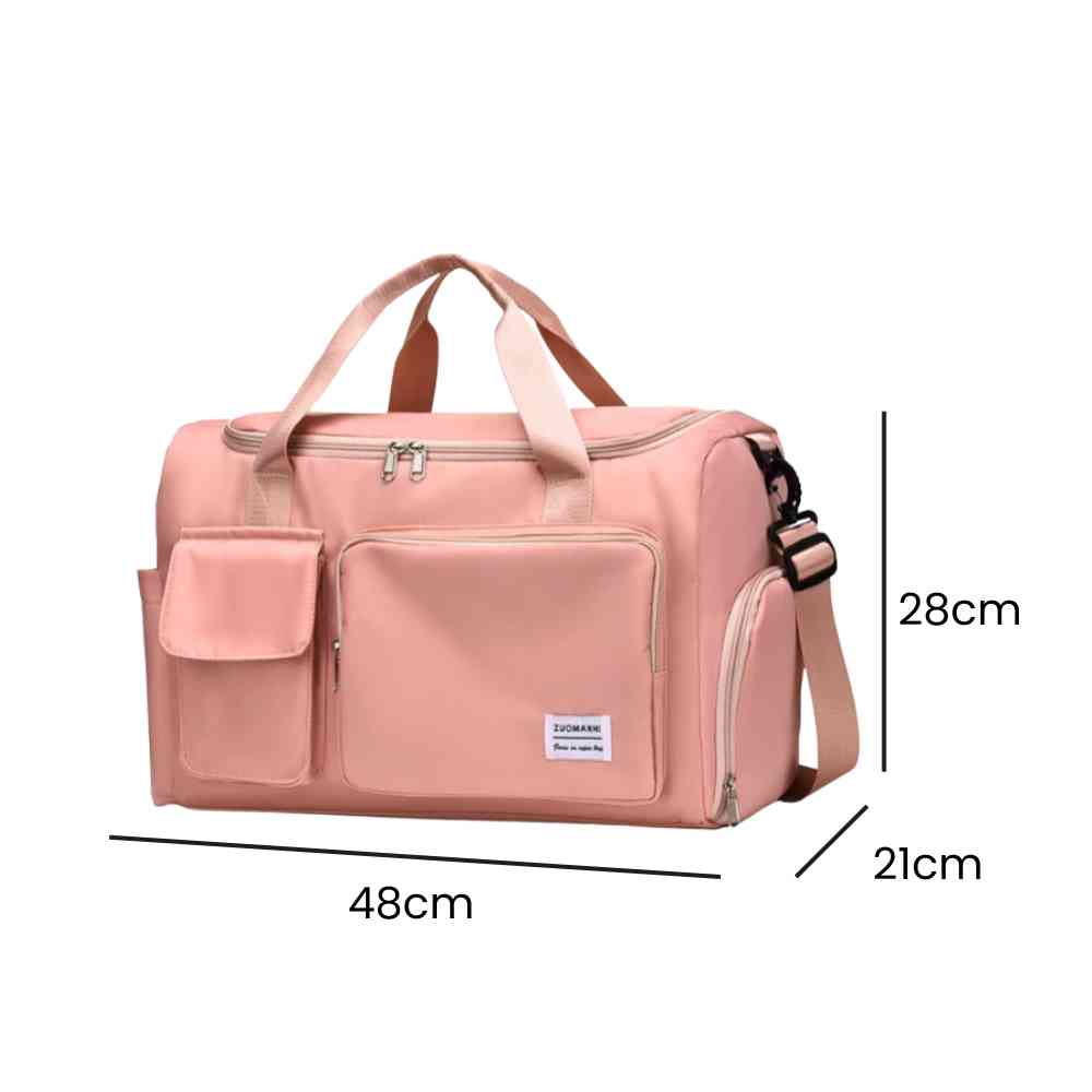 Bolsa de Academia e Viagem Feminina Multifuncional Rosa Pêssego Urbanno, com linhas indicando suas dimensões de 48cm de comprimento, 28cm de altura e 21cm de profundidade.