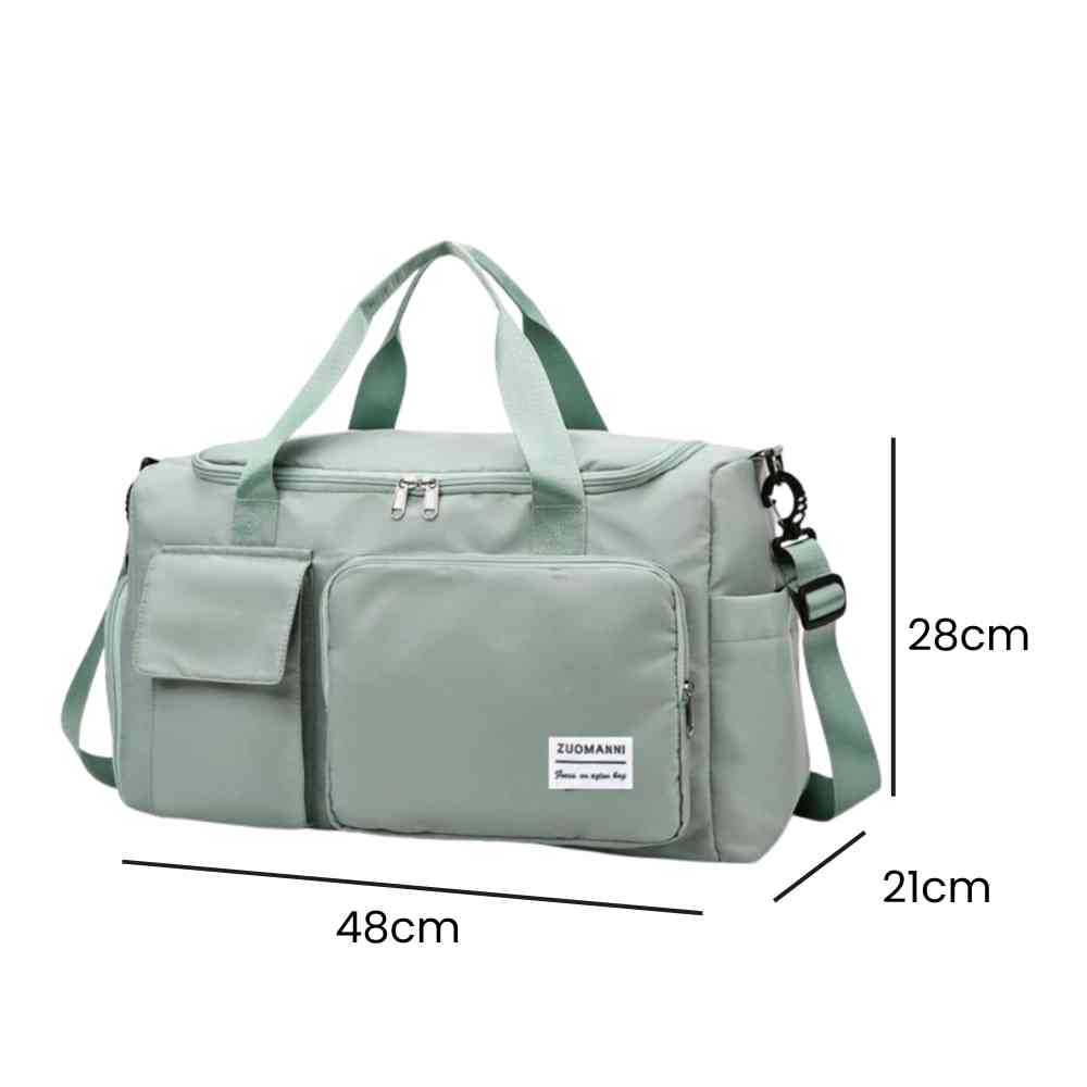 Bolsa de Academia e Viagem Feminina Multifuncional Verde Urbanno, com linhas indicando suas dimensões de 48cm de comprimento, 28cm de altura e 21cm de profundidade.