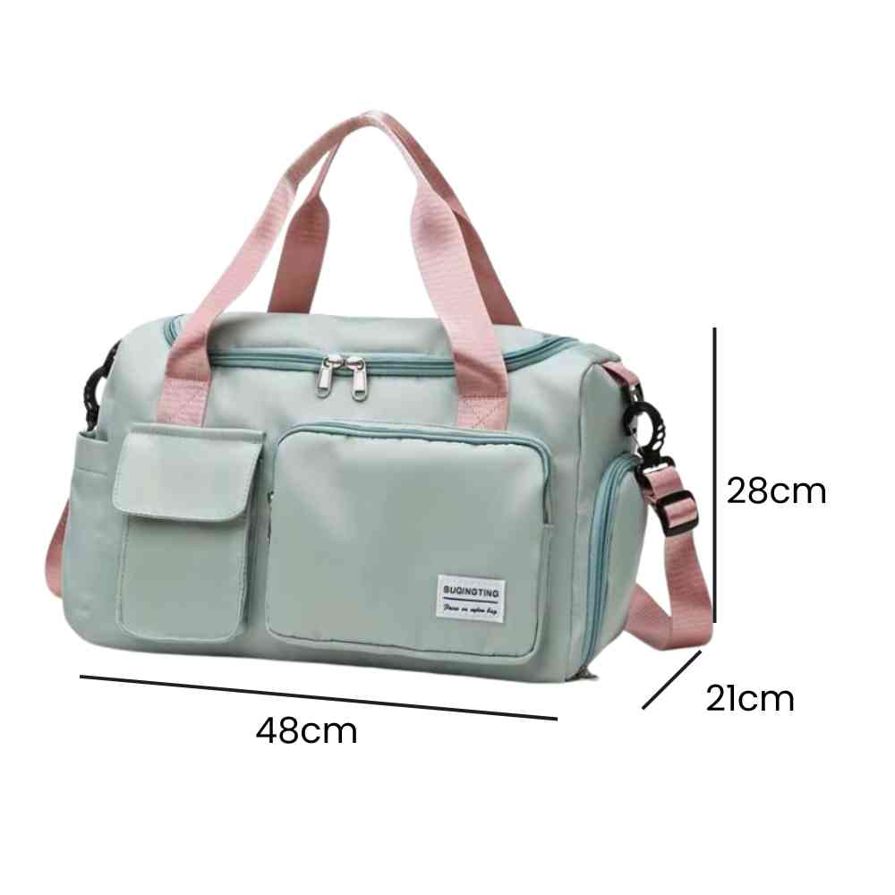 Bolsa de Academia e Viagem Feminina Multifuncional Verde Menta com Alça Rosa Urbanno, com linhas indicando suas dimensões de 48cm de comprimento, 28cm de altura e 21cm de profundidade.