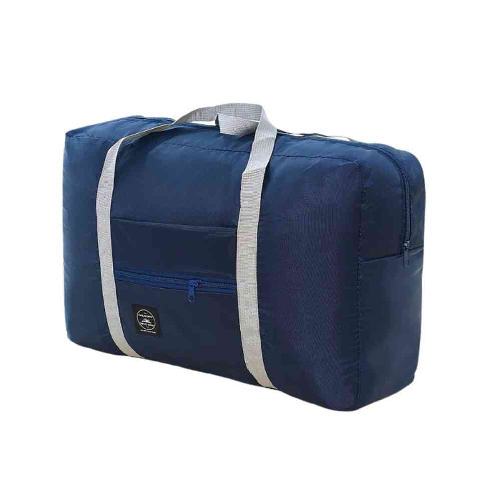 Bolsa de Academia e Viagens Dobrável Azul Escuro Urbanno, vista frontal, com alças cinza claro e bolso frontal com zíper, destacando seu design compacto e funcional.