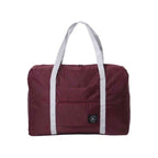 Bolsa de Academia e Viagens Dobrável Vinho Urbanno, vista frontal, exibindo alças brancas e um bolso frontal com zíper, destacando seu design compacto e funcional.