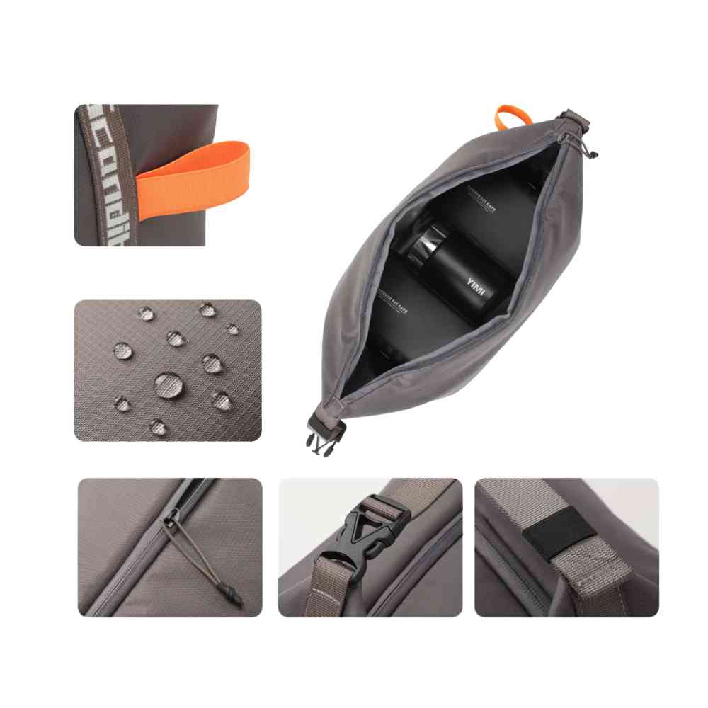 Bolsa Térmica Minimalista Urbanno cinza, mostrando interior com garrafas, tecido impermeável e detalhes de alça e zíper