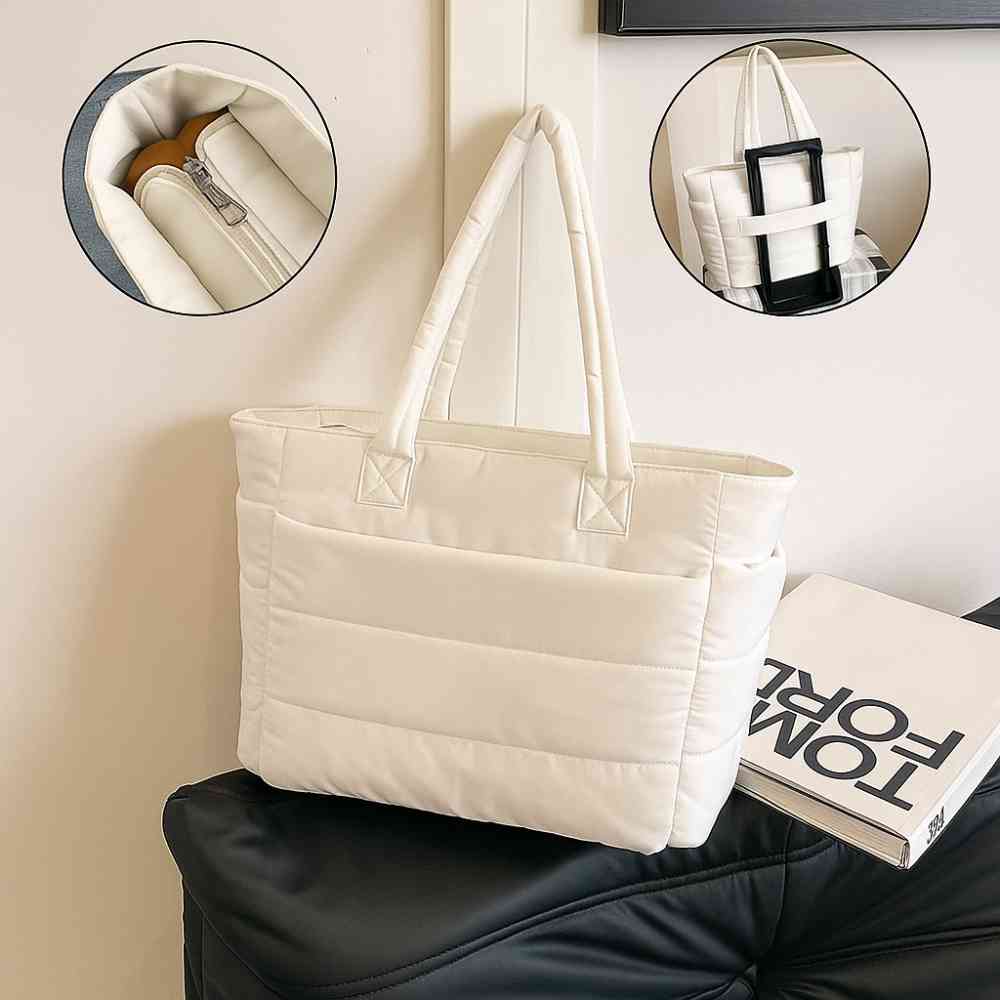 Bolsa Tote de Academia e Dia a Dia Feminina Acolchoada Urbanno branca, com detalhes do compartimento interno com zíper e acoplamento para mala de viagem