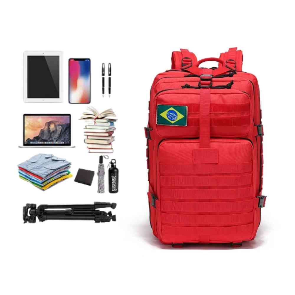Mochila Exército Militar Tática 50L Vermelha Urbanno, vista lateral, com diversos itens de viagem e expedição como laptop, tablet, roupas e tripé dispostos ao lado, demonstrando sua ampla capacidade de organização.