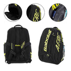 Mochila Raqueteira Babolat AERO Preta com amarelo da Urbanno, mostrando detalhes do compartimento para sapatos, zíperes reforçados e alça de ombro ajustável, destacando organização e conforto