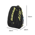 Mochila Raqueteira Babolat nas cores preta com amarelo da linha AERO, exibindo suas dimensões de 52cm de altura, 32cm de largura e 24cm de profundidade, ideal para transportar equipamentos de tênis da loja urbanno