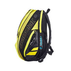 Mochila Raqueteira Babolat amarela da Urbanno, vista lateral, mostrando compartimentos laterais, alças acolchoadas e logotipos, ideal para transporte de equipamentos esportivos