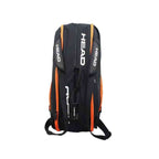 Raqueteira Head Hard Shell para 6 a 9 Raquetes de Tênis Preta e Laranja Urbanno, vista das costas como mochila, exibindo alças acolchoadas e ajustáveis para transporte confortável.