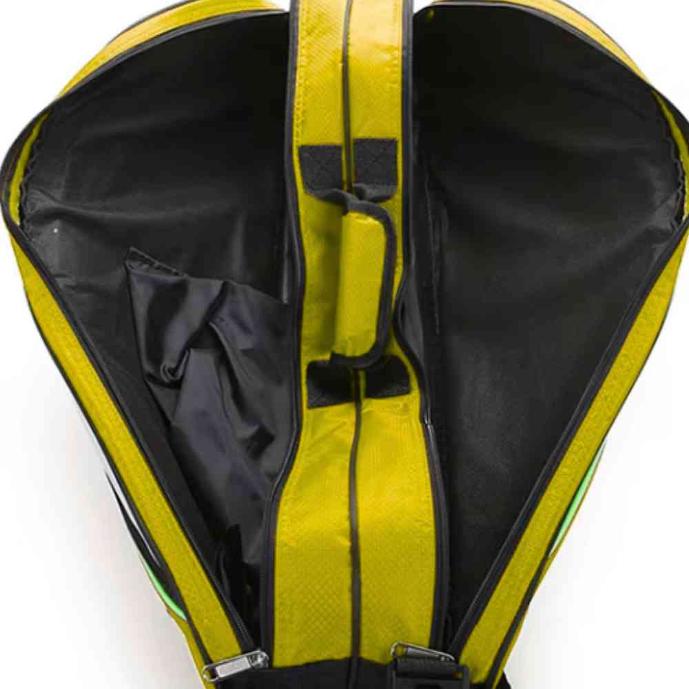 Raqueteira Yonex 3 Raquetes amarela, vista interna aberta mostrando os três compartimentos principais, destacando o amplo espaço para equipamentos urbanno